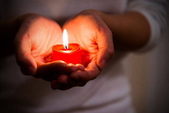 sacred heart hand and candle